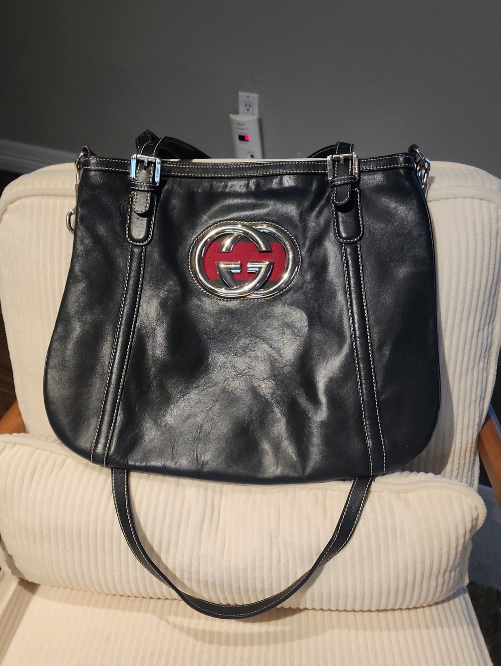 Gucci Black Leather Shoulder Bag with Red Logo Emblem